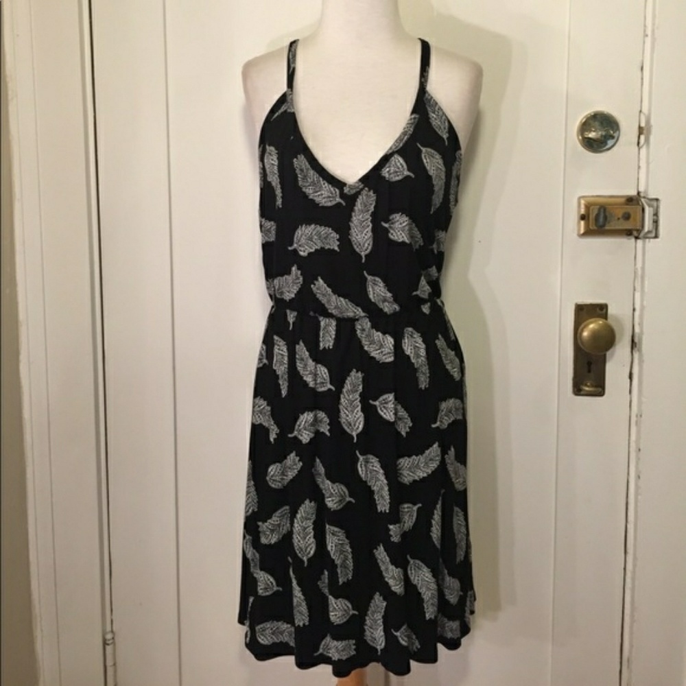 Cute Black dress with white feathers